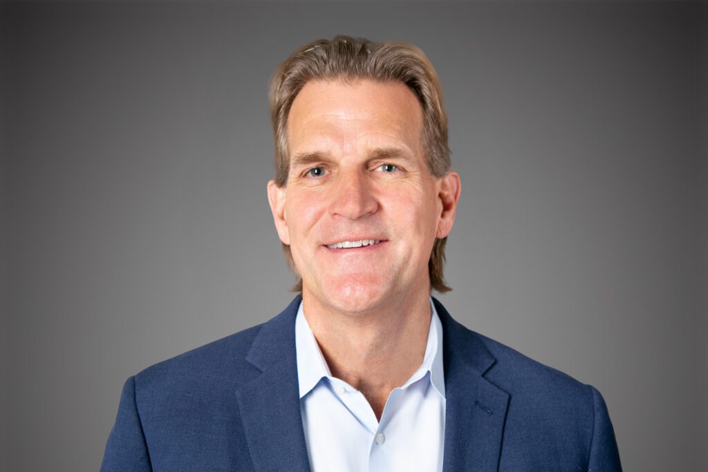 Headshot of Pete Oldendorf in front of a gray background.